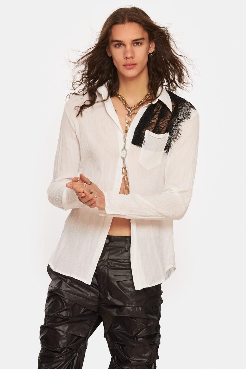 Loose, oversized shirt made from semi-sheer linen with black lace details on one side. Dropped shoulders. Very soft and flowy. Perfect for hot summer nights.
