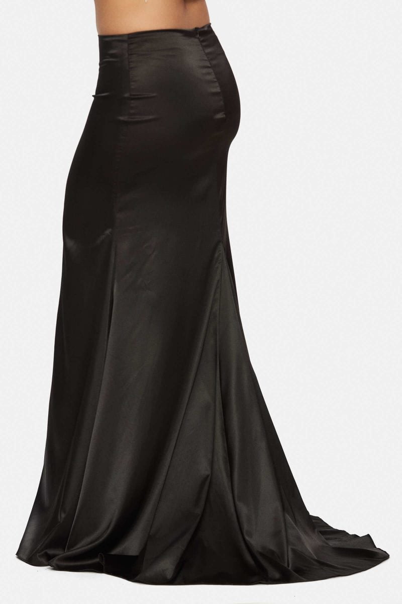 Long skirt with an extra train at the back. Made out of black satin.