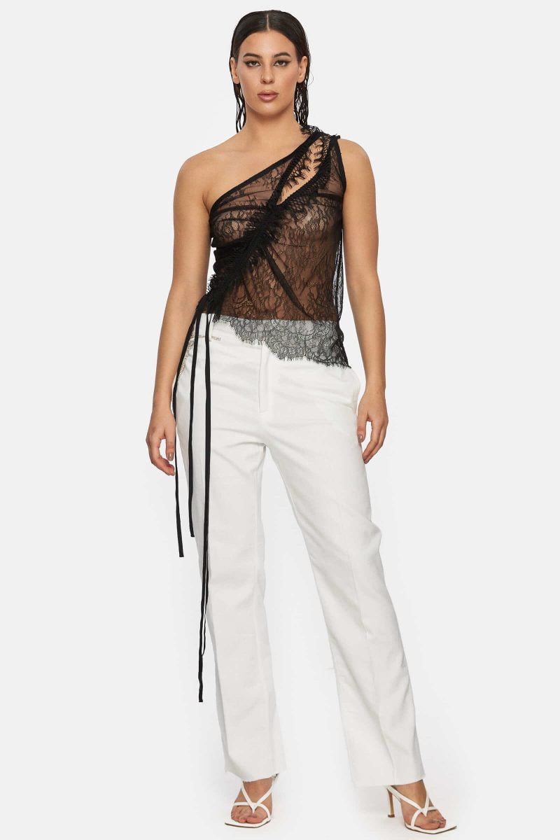 Sheer top with adjustable cords. Cut-outs on front and back.